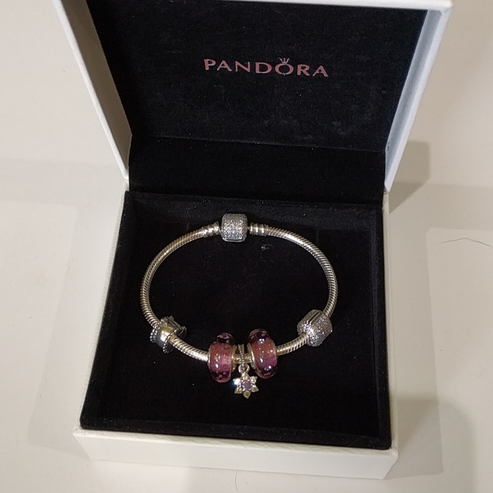 Pandora bracelet with purple and clear charms
