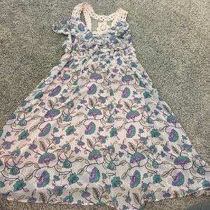 Beautiful floral dress with ruffles in the front