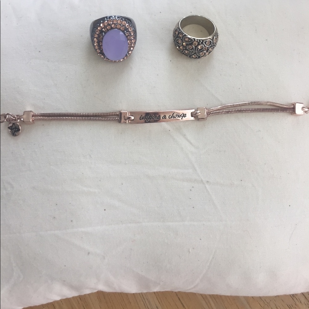 Rose gold, gold and gunmetal gray costume jewelry.