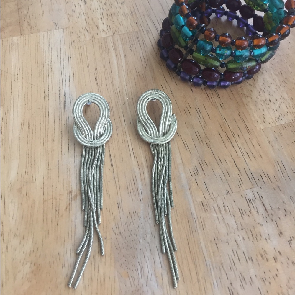 Costume jewelry earrings and bracelet bundle.