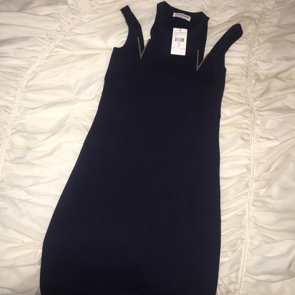 Brand new cocktail dress with tag still on it