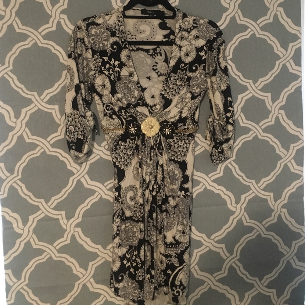 Sky Plunging neckline flower detail party top