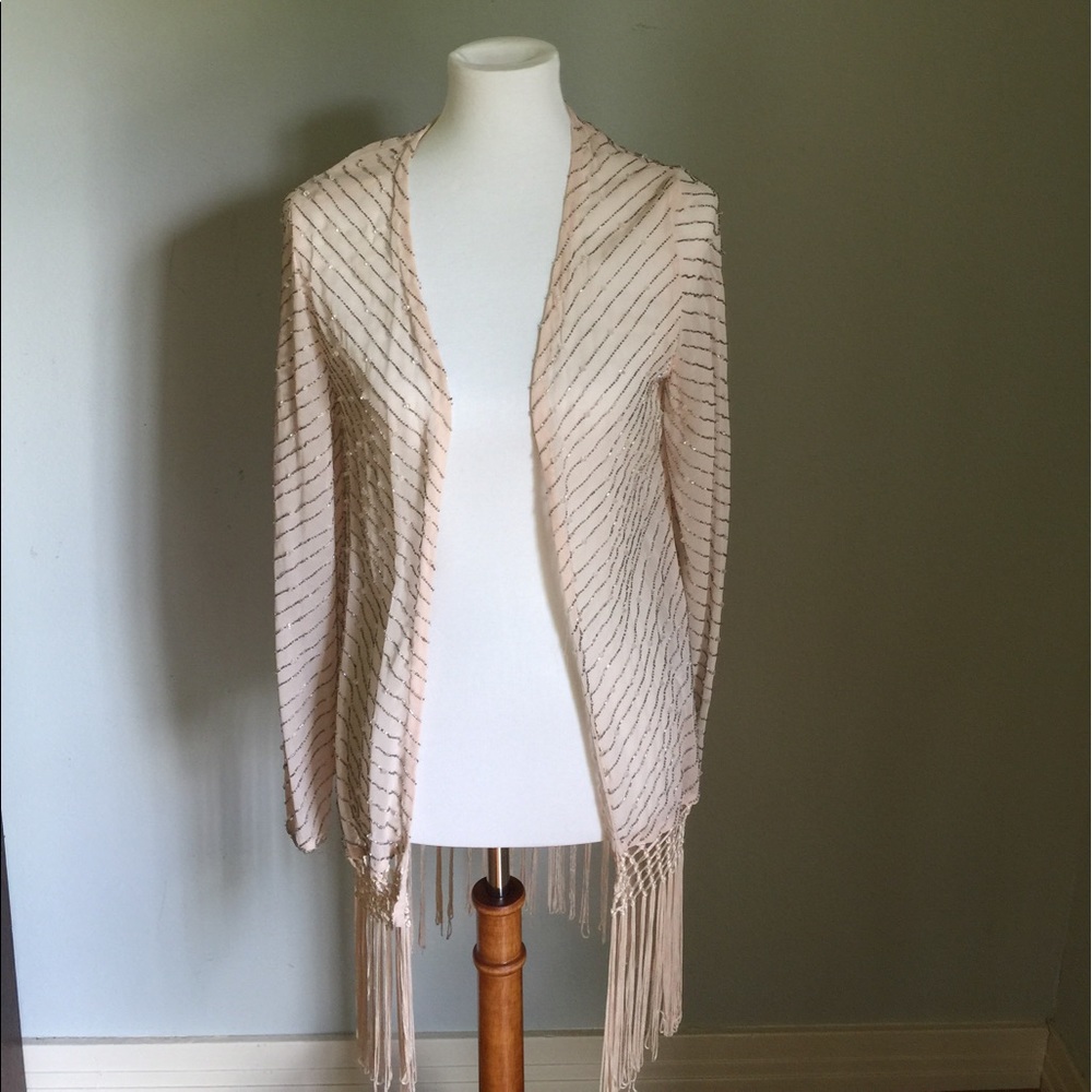 Beaded jacket with fringe