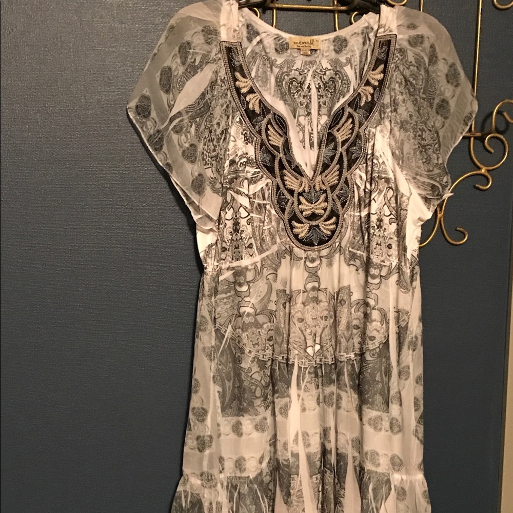 Beautiful soft dress with embroidered designs.