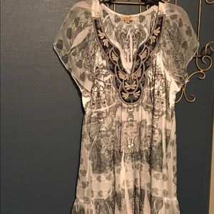 Beautiful soft dress with embroidered designs.