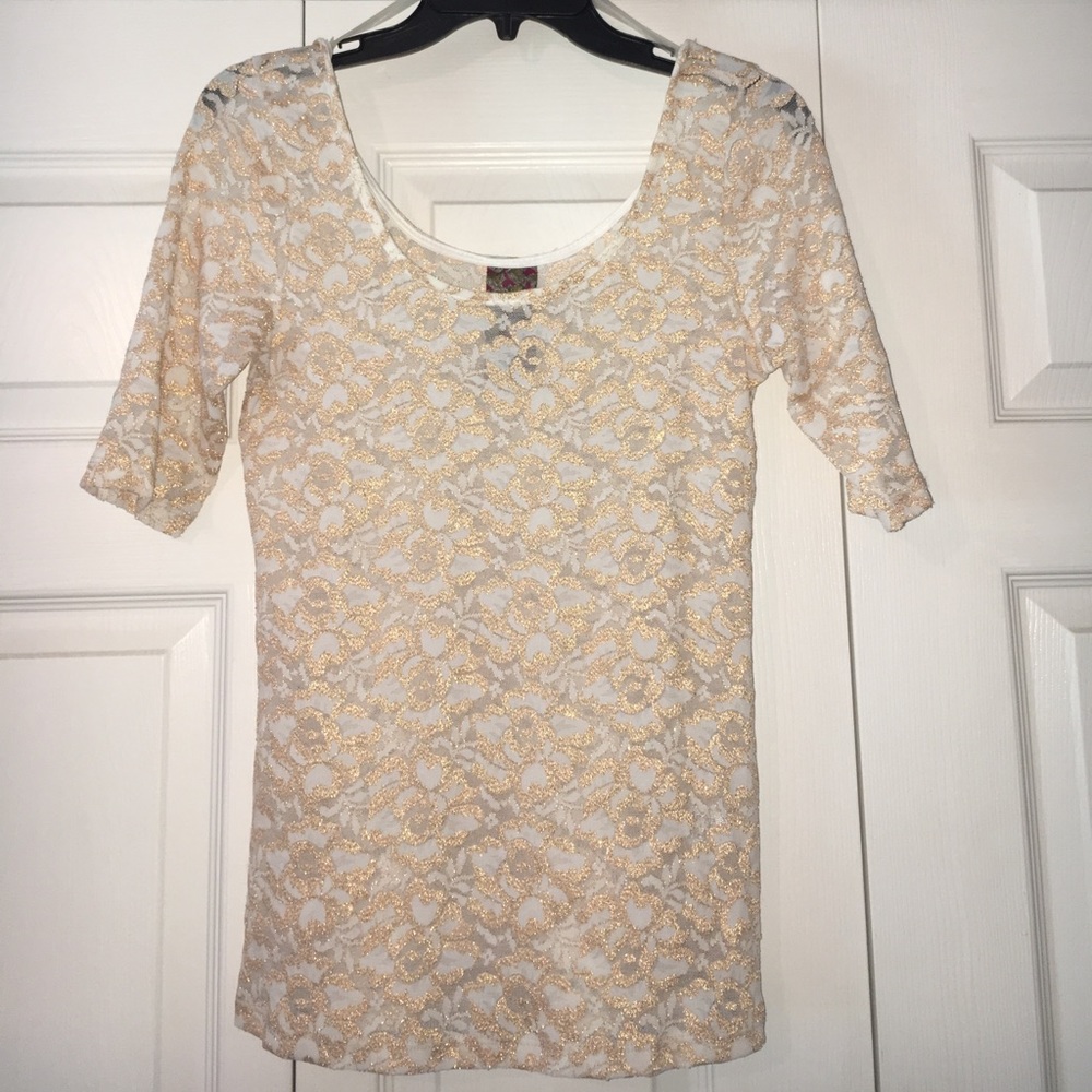 White and gold top