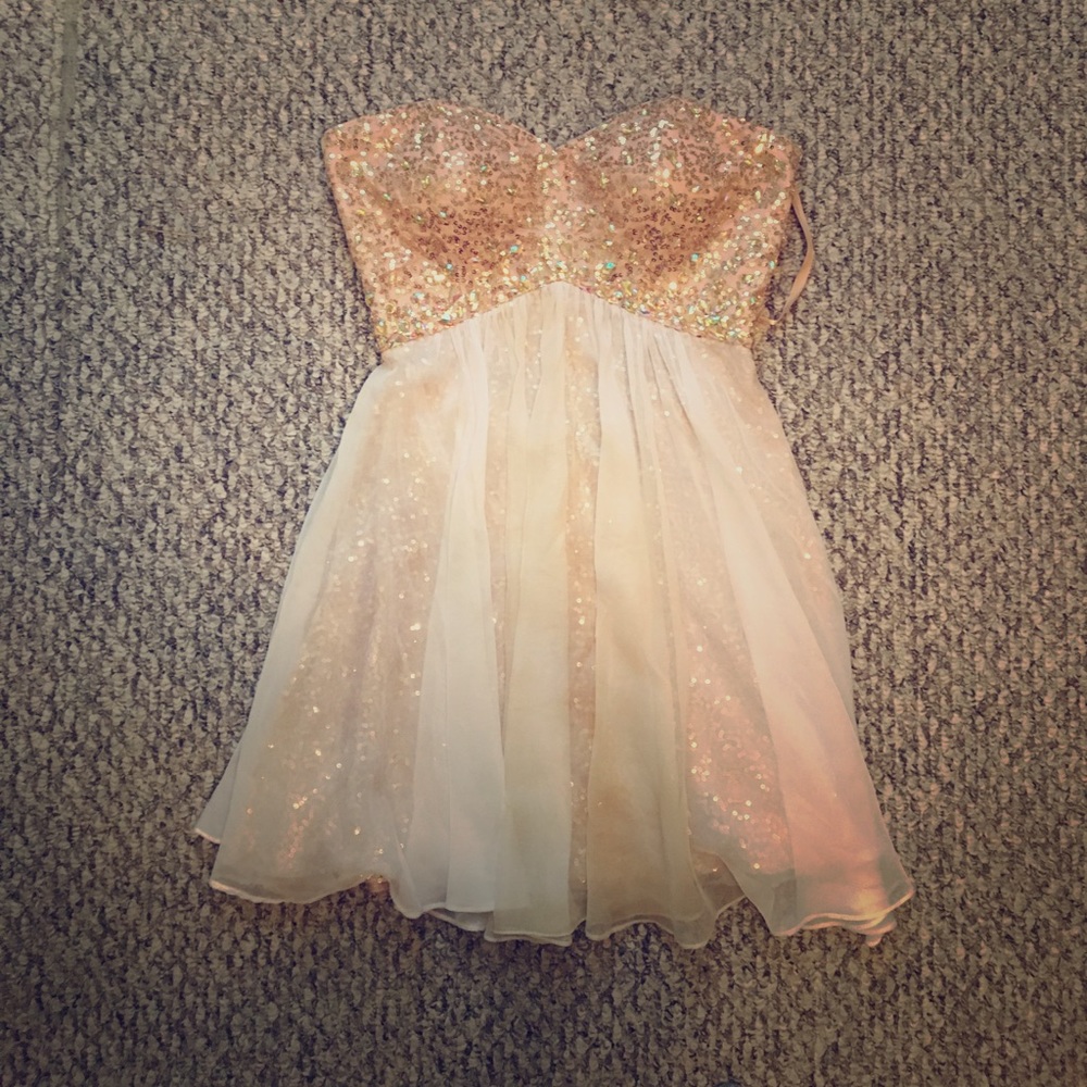 Gold sequined strapless cocktail dress