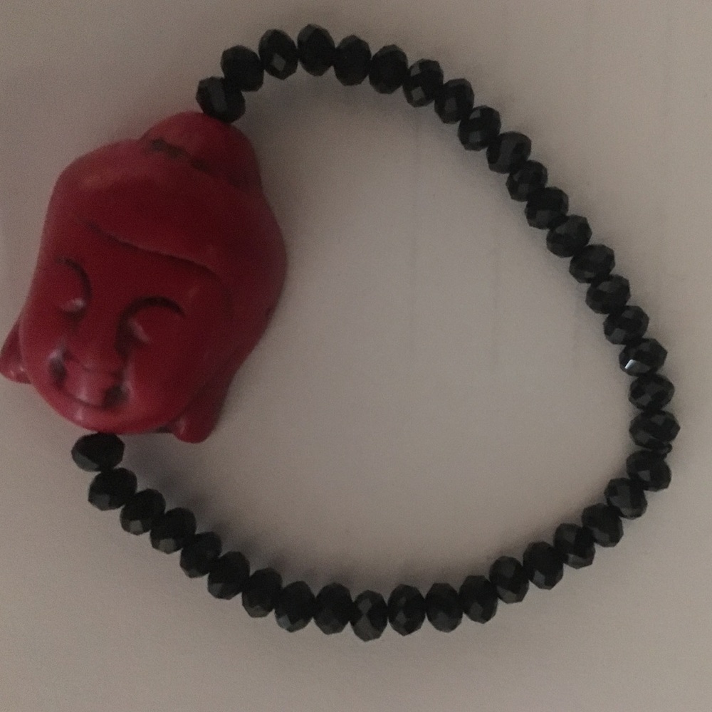 Red Buddha bracelet with Rondelle spinal beads