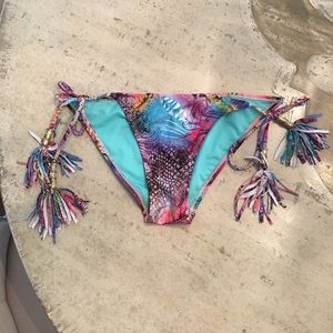 Op tassel swim bottoms