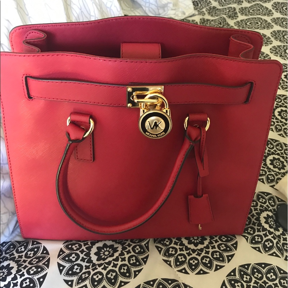 Authentic red Michael Kors handbag