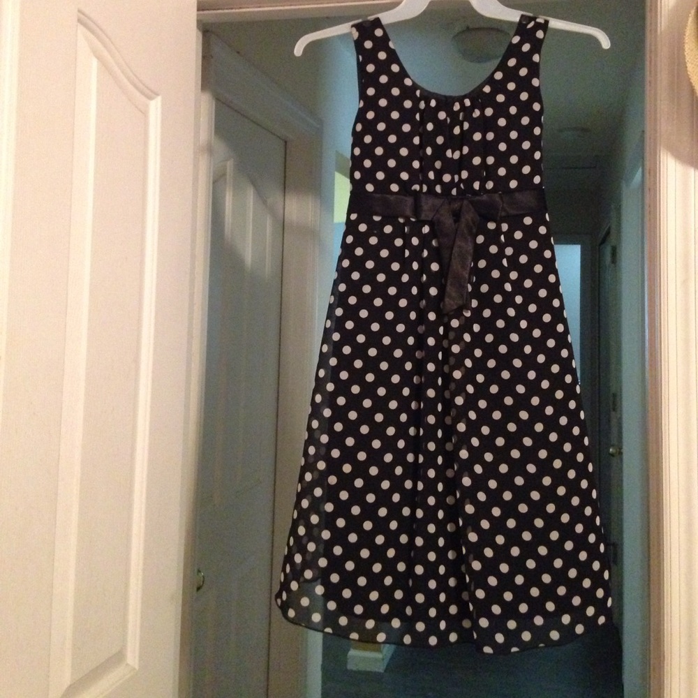 Black polka dot dress with black bow