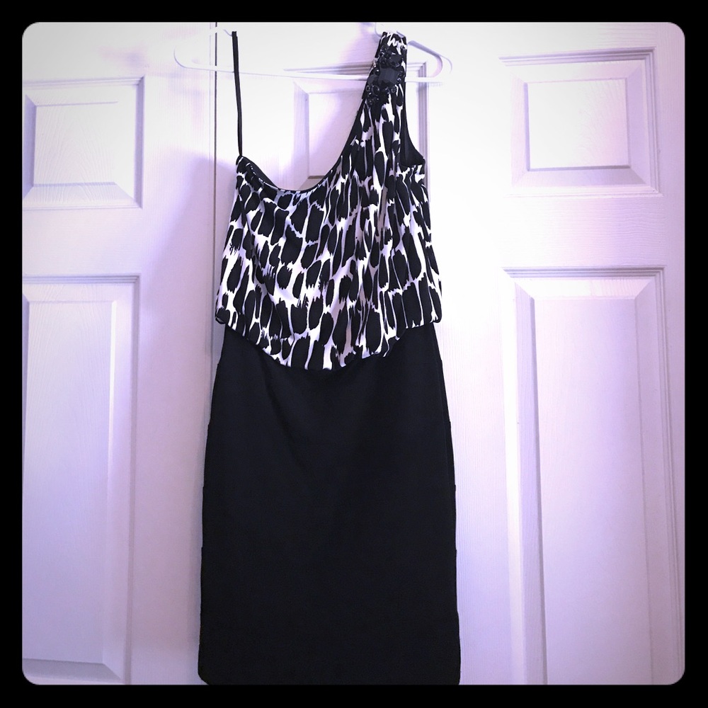 Black and white, one sleeve dress.