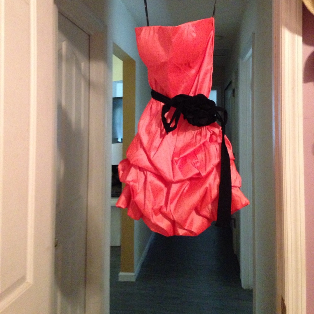 Peach strapless dress with big black flower