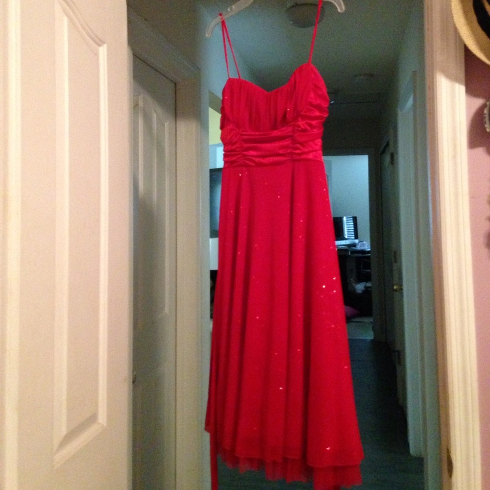 Red glittered dress for a junior girl