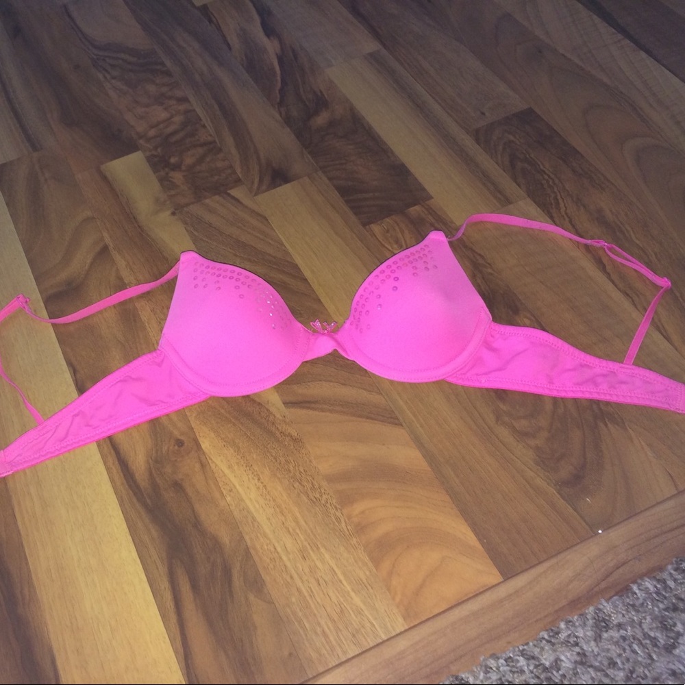 A hot pink size 30A bra