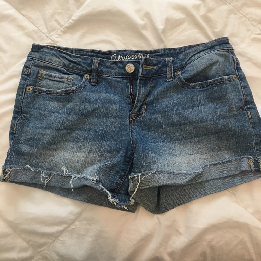 Distressed cut off denim shorts