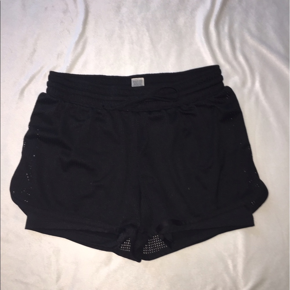 Athletic shorts with spandex underneath