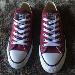 Maroon Chuck Taylors, worn only once.