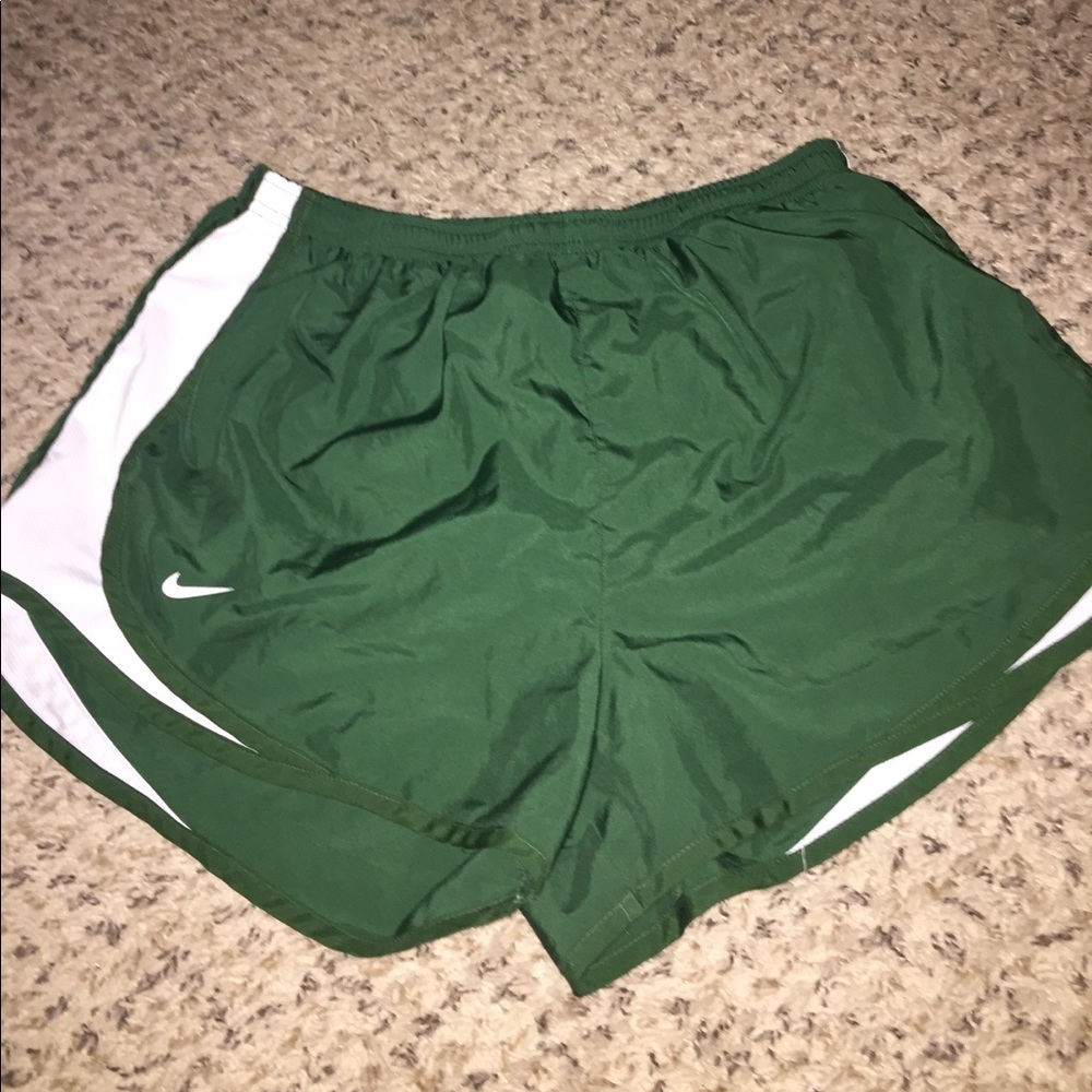 Green Nike running shorts