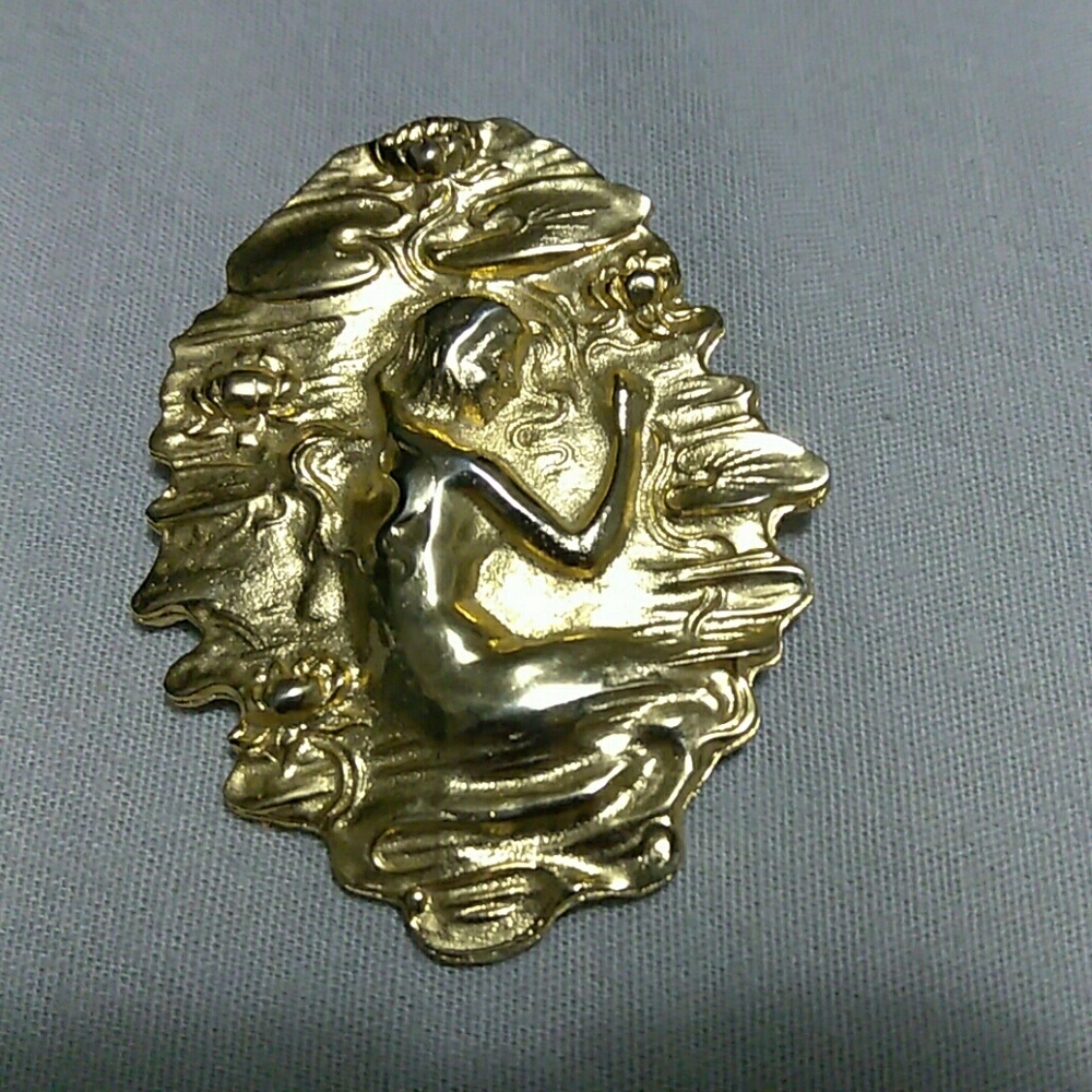 70s gold plated depiction mermaid/Goddess broach