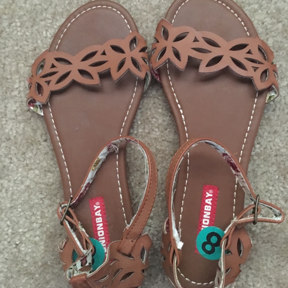 New cute tan sandals, was in storage size 8.