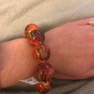 Large bead multi color bracelet.