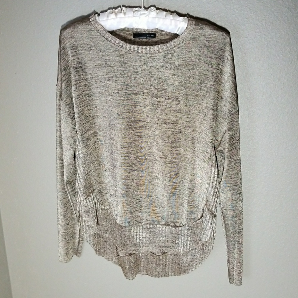 Silky long sheer sleeved shirt.