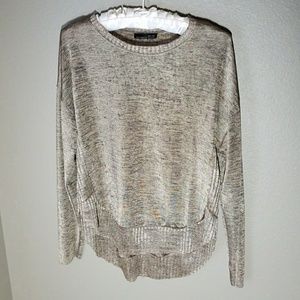 Silky long sheer sleeved shirt.