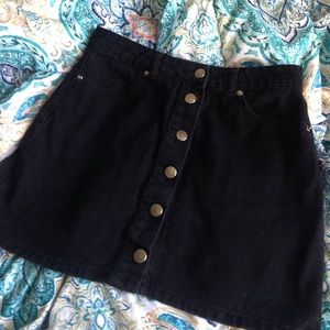 Black denim mini skirt
