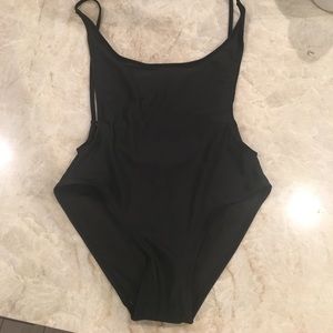 Whole/one piece black bathing suit