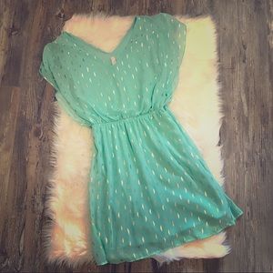 Turquoise and shiny gold dress