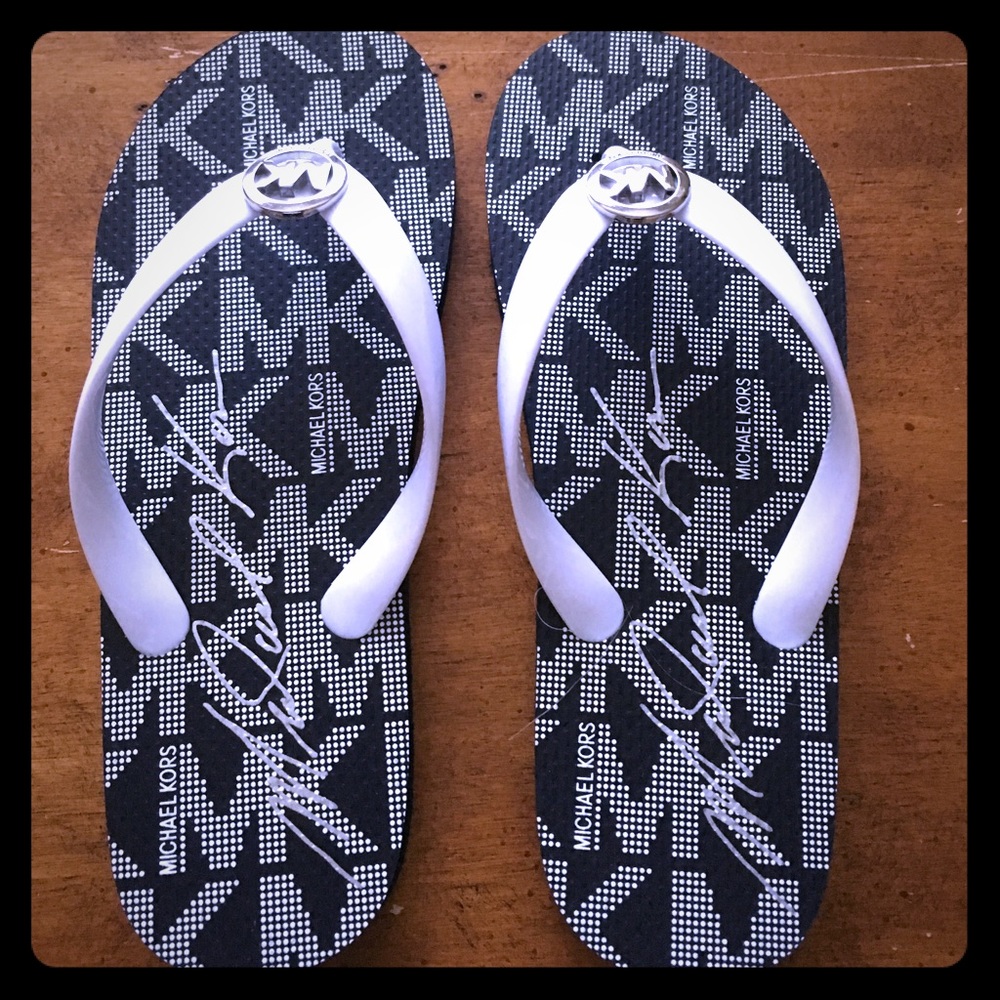 Michael Kors brand new flip flops size 6