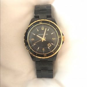 Black and gold Michael Kors watch