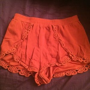 Orangey red fabric shorts