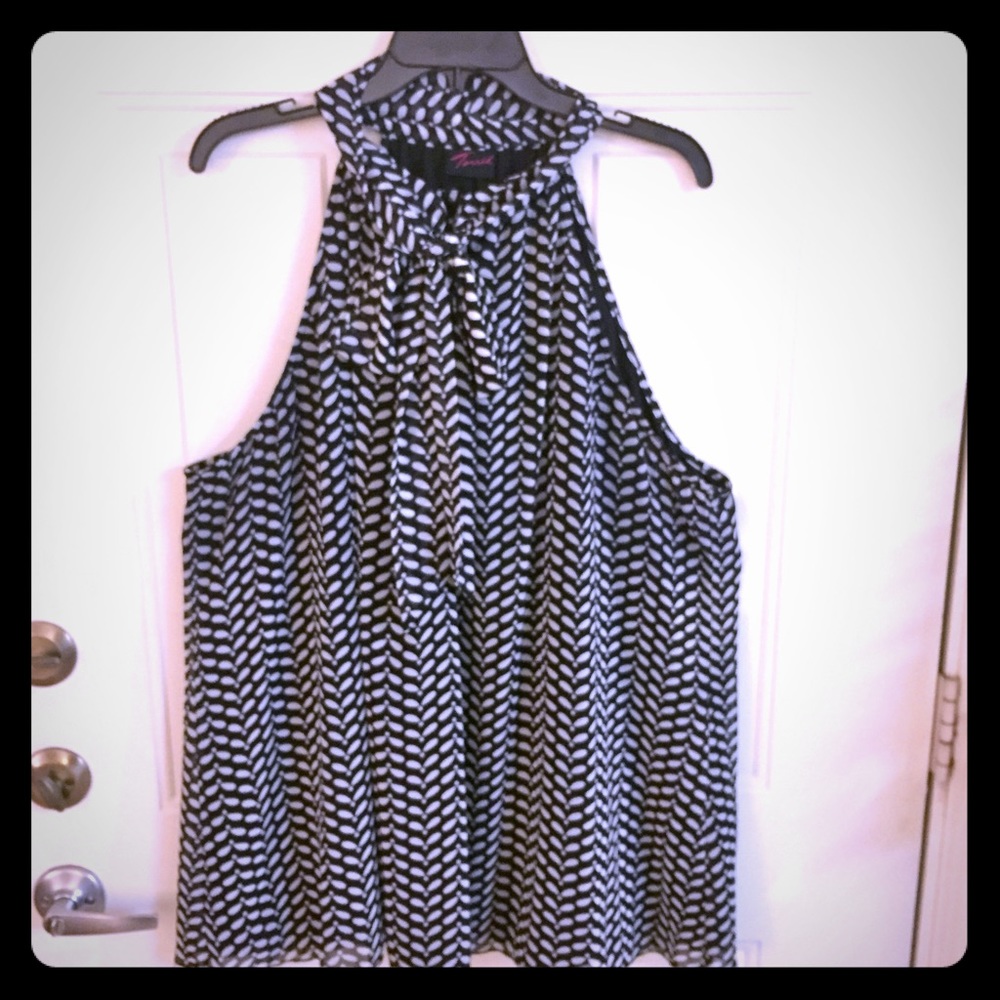 Sassy black and white sleeveless blouse