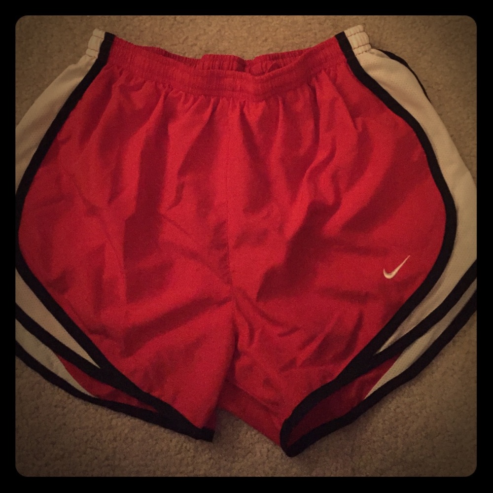 Nike red running shorts