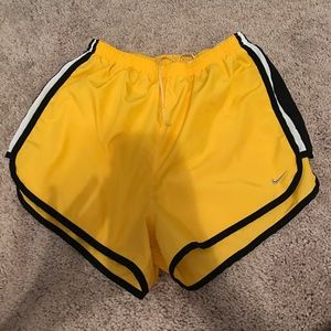 Yellow Nike dri-fit shorts