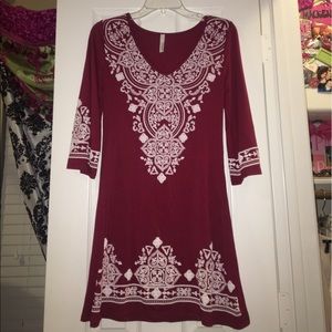 NEVER WORN. Crimson patterned dress.