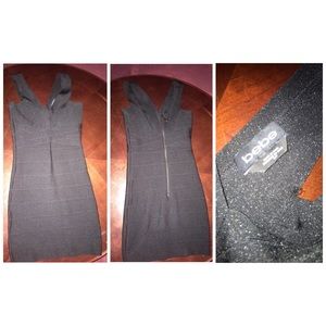 Classic body con black Bebe dress.