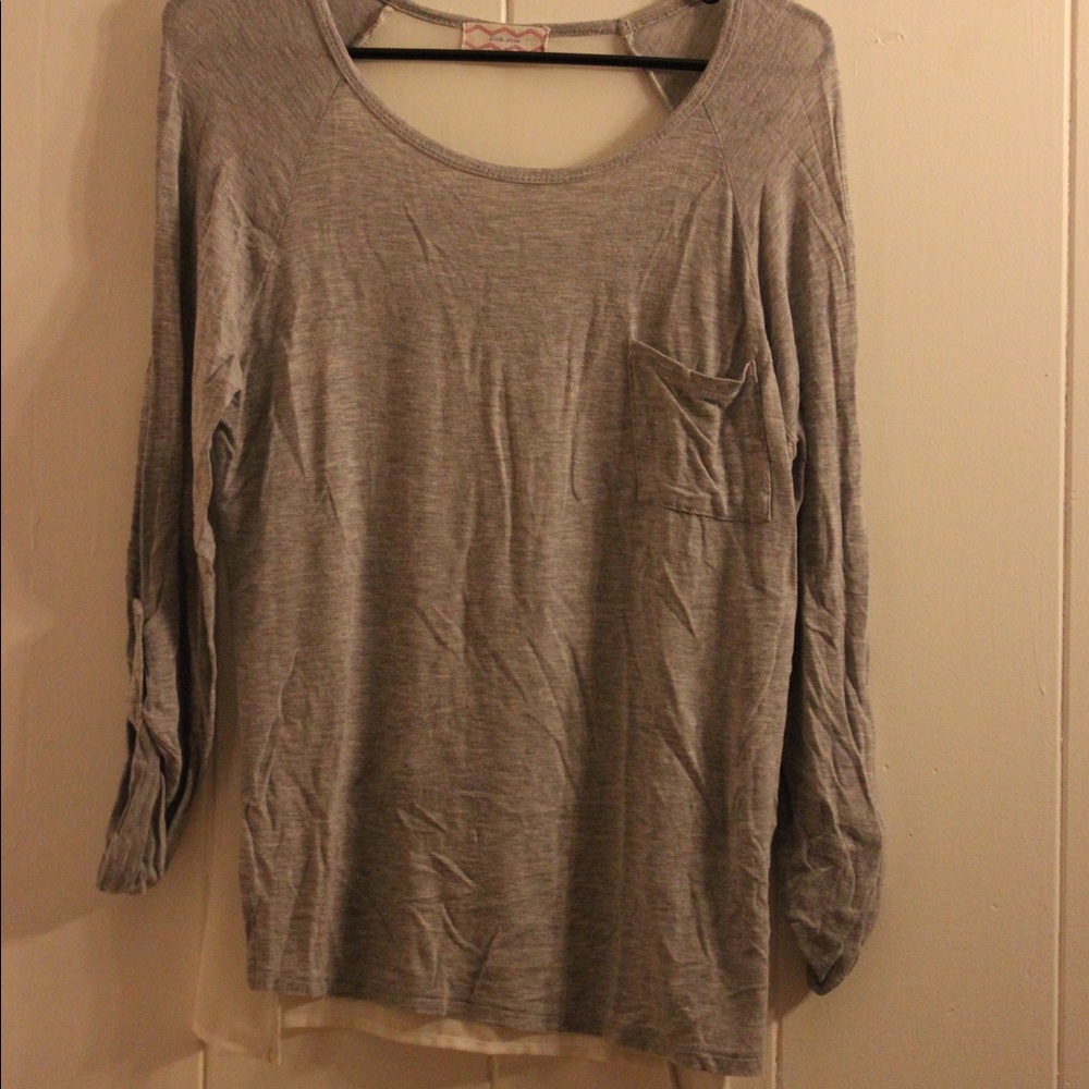 Gray shirt with pocket, sheer in the back
