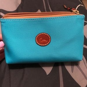 Original Dooney & Bourke cosmetic bag.