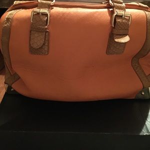 Orange Aldo  purse.