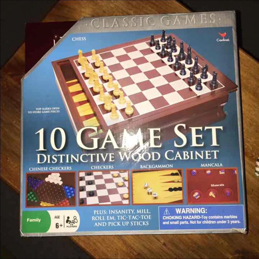Sale:  NEW 10 Game Set in a Wood Cabinet