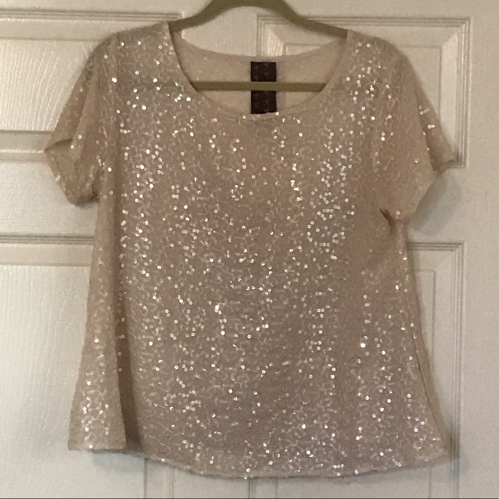 Slightly sheer white shirt with sequin detail