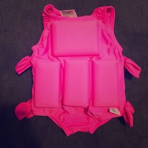 Pink one piece bathing suit w/ floats built in
