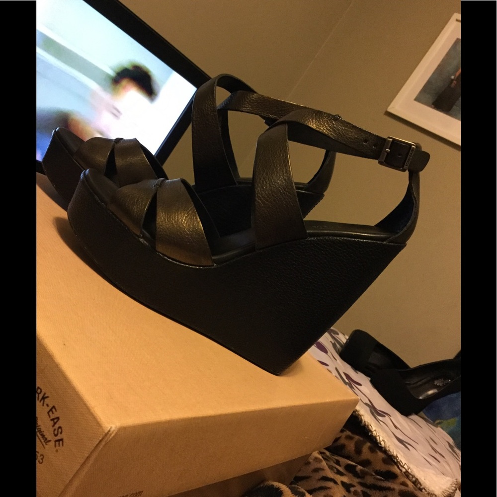 Black and metallic like gold leather wedges!