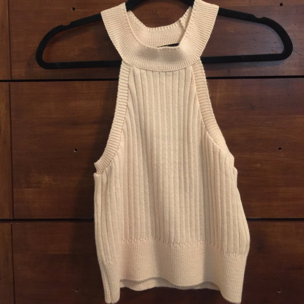 Light pink sweater top. Has never been worn. NWT