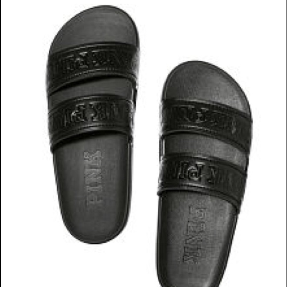 Pink black flip flops