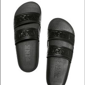 Pink black flip flops