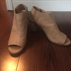 Peep toe nude bootie heals